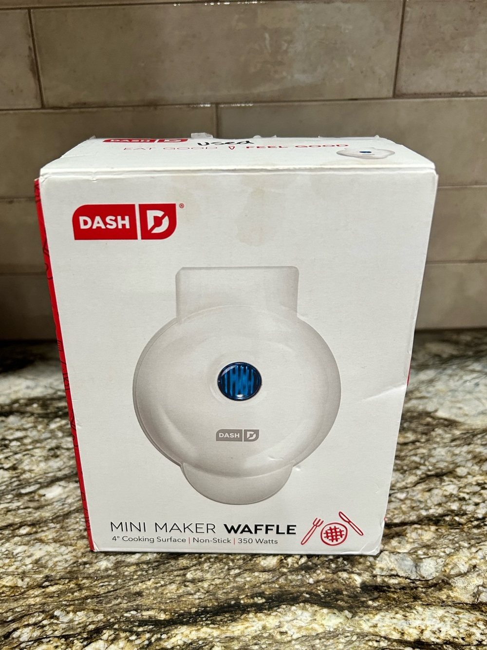 Dash Mini waffle maker used in box